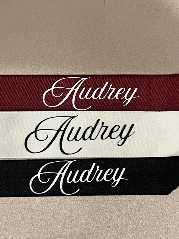 Personalised ribbon name tags in burgundy, cream and black